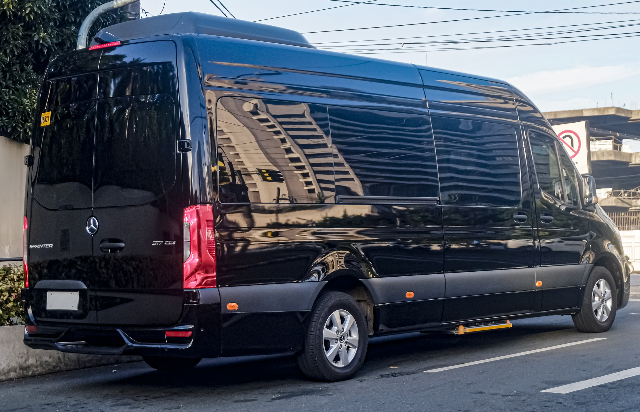 Black Mercedes-Benz Sprinter executive van